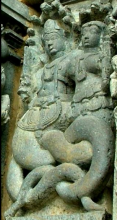 A Hoysala sculpture of a Nāga couple. Halebidu.